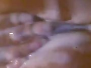 Dirty slut fingers pussy and ass while masturbating